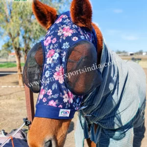 Horse wearing navy floral fly mask with pink flowers and raised black mesh eye cups, article TM-FM-003