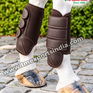Brown Perforated Horse Brushing Boots with Triple Straps in brown, perforated-look outer panels, contrasting stitching and three adjustable fastening straps – T.M. Exports India wholesale equestrian catalogue