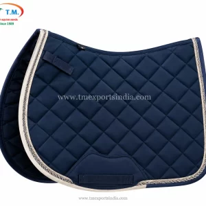 Navy blue quilted saddle pad with diamond stitching, cream binding, decorative cord, and reinforced girth area.