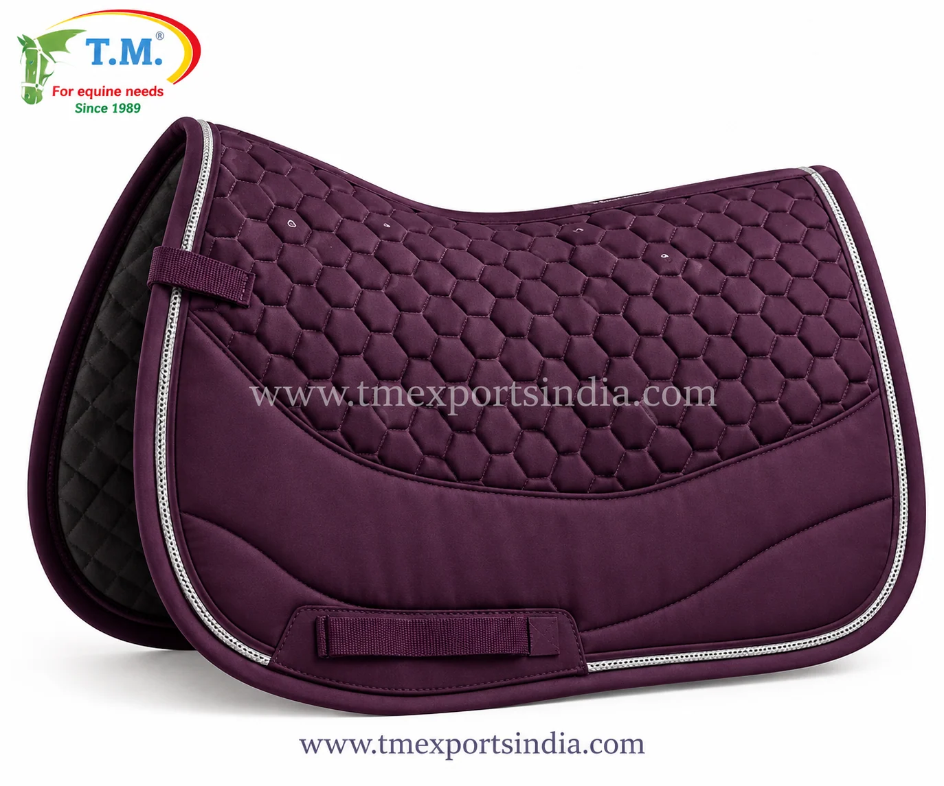 Deep plum saddle pad with hexagonal quilting, curved lower panel, and silver-colored piping.