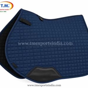 Navy blue saddle pad with fine square quilting, dark reinforced girth patch, and curved lower edge.