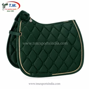 Forest green saddle pad with geometric quilting, gold-colored trim, and a plush detail at the front.