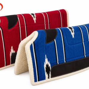 Two Western saddle pads displayed together in red and blue with striped geometric designs and light plush edges.