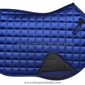 Royal blue saddle pad with square quilting, navy border, and black reinforced girth patch.
